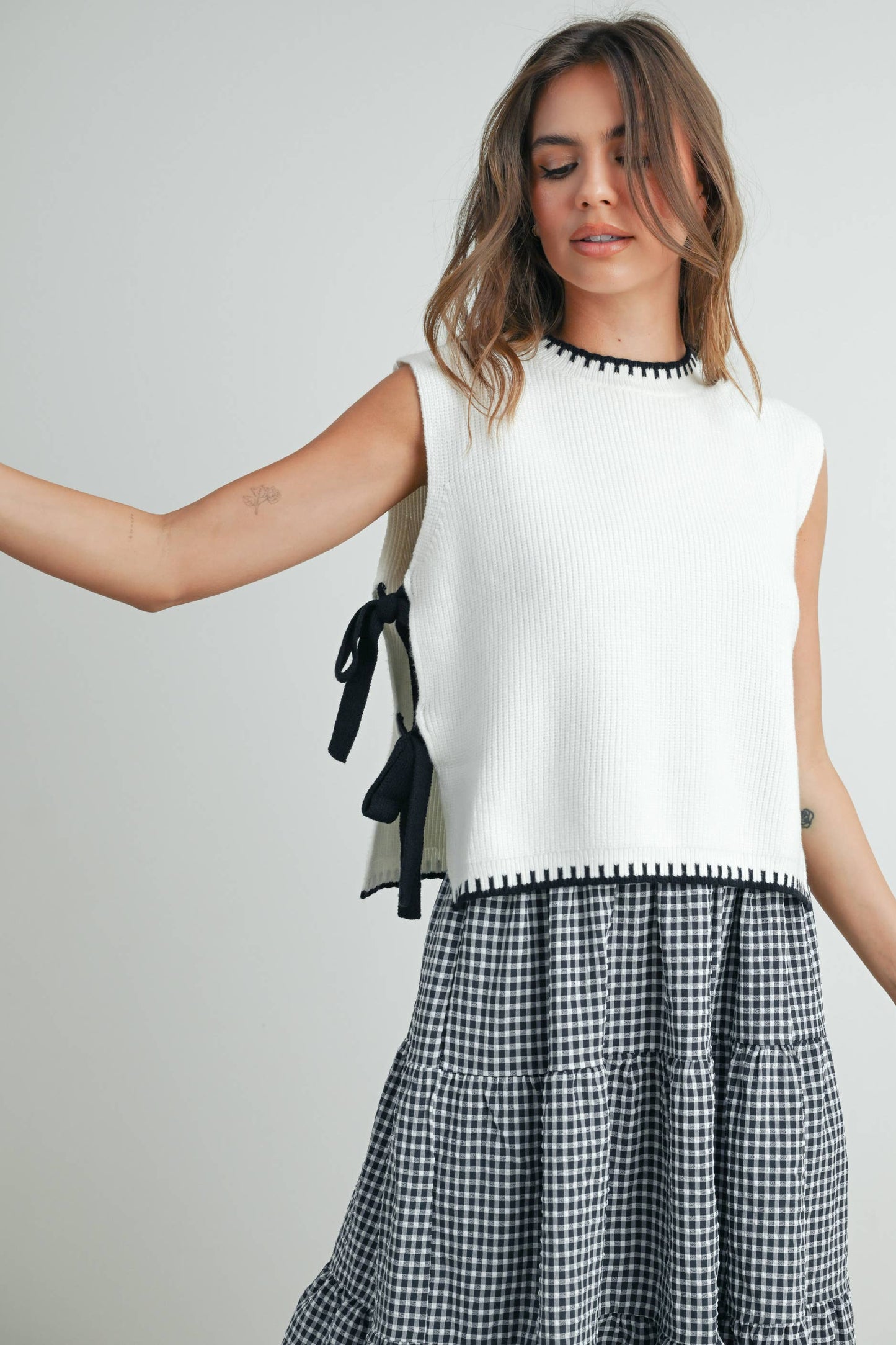 Ivory Sweater Top With Black Bows