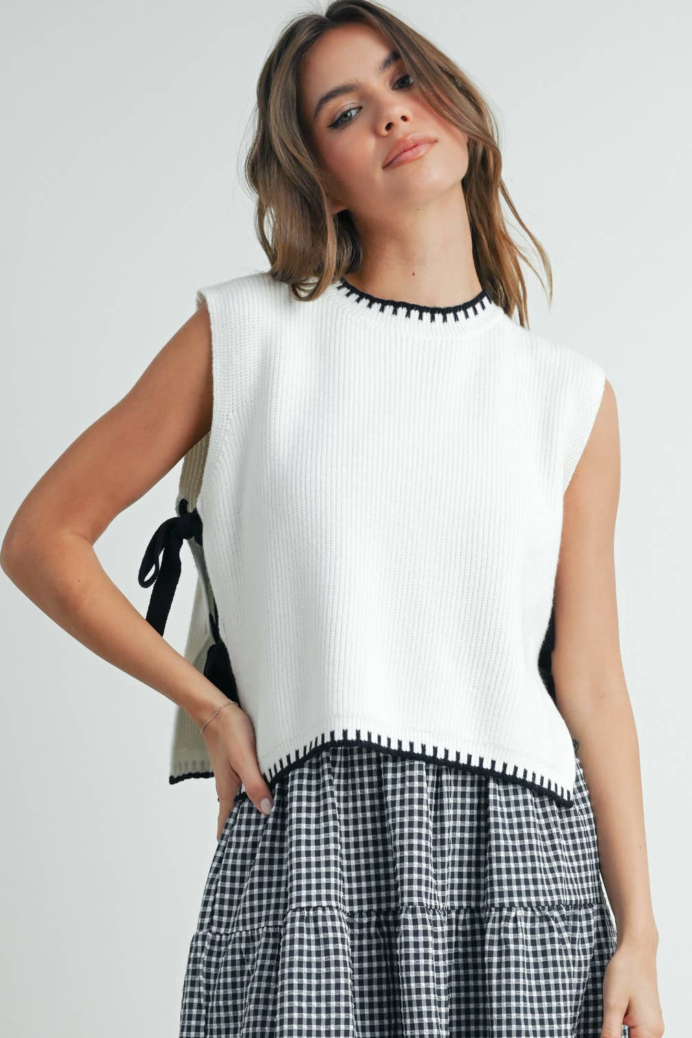 Ivory Sweater Top With Black Bows